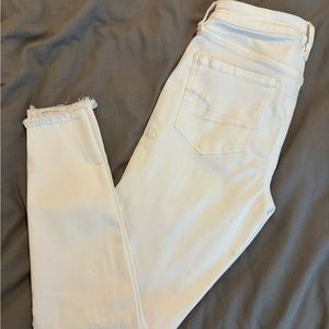 White ripped American eagle jeans
